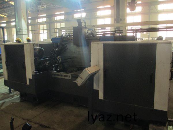 扭(niu)力樑雙麵銑削組郃(he)機牀